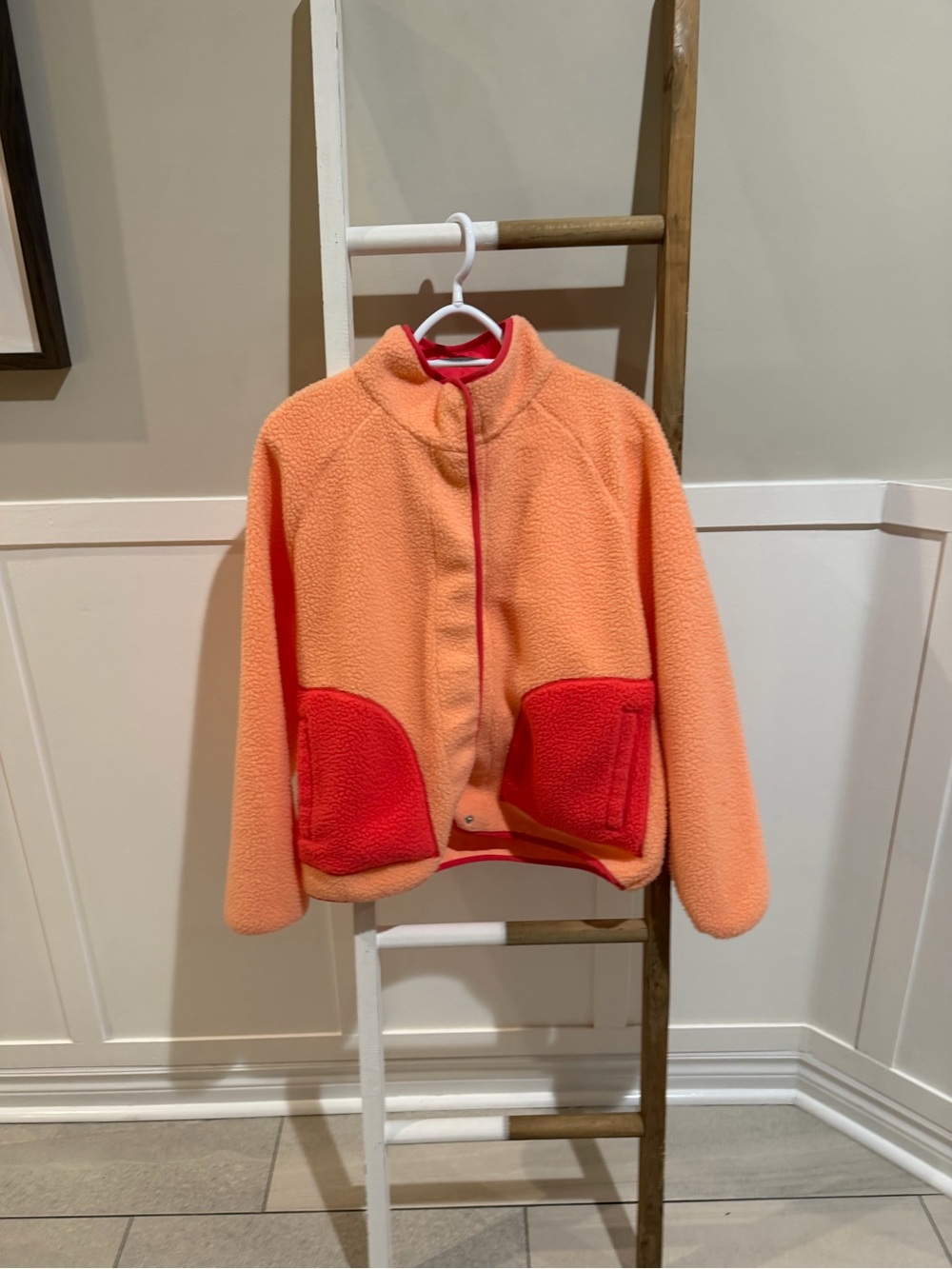 Mondetta ladies Peach-Orange Fleece Jacket with Red Pockets